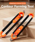 Adjustable Lock Contour Gauge For Nailing Irregular Shapes With Hella Precision As A Versatile Profile Duplicator And Scribing Tool. Contour forming tool on wooden surface.
