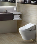 Tough As Nails GFCI Outlets 20 Pack 20 Amp Weather Resistant White Receptacles mounted near a modern toilet in a bathroom.