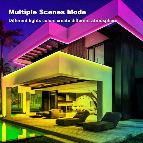 Modern house with colorful Bluetooth LED Strip Lights 100 Ft With Music Sync highlighting architectural features.