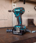 18V LXT Brushless Cordless Drill And Impact Driver Combo Kit, 2-Piece Set With 5.0Ah Batteries, Lightweight At 6 Pounds shown on workshop table