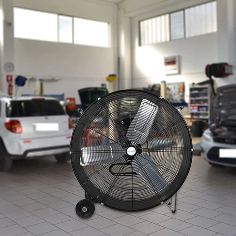 Beastly 30 Inch High Velocity Drum Fan With 13000 CFM High And 9000 CFM Low in an industrial garage setting