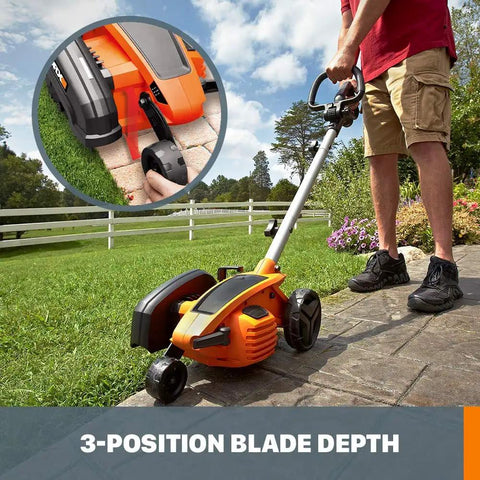 12 Amp Corded Electric Lawn Edger And Trencher With Seven Point Five Inch Cutting Blade WG896, shown in use on sidewalk edge