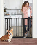 Adjustable Baby Gate For Stairs And Doorways, 30 Inches Tall, Fits Openings From 29.53 To 35 Inches Or 40.55 To 46 Inches, Auto Close With Easy Walk Through, Includes 2.75 Inch And 11 Inch Extensions, Great For Babies And Pets, installed in kitchen.