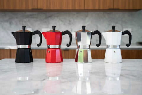 Black, red, silver, and white stovetop espresso makers on marble counter; Stovetop Espresso Maker For Home Brewing And Camping Italian Moka Pot In Classic Aluminum 6 Cup Mocha Pot Easy To Use And Clean Quick Heat Up Portable Silver Sturdy Aluminum Body For Even Heating Durable Construction With Easy Cleanup And Travel Friendly