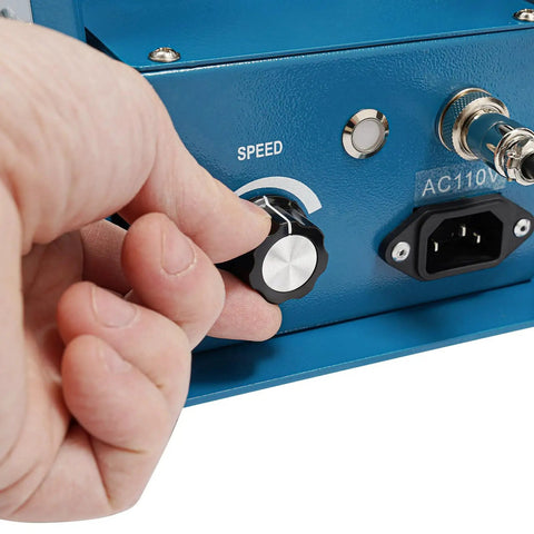 Adjusting speed dial on Dead Center 110V Rotary Welding Positioner Turntable, with clear markings for smooth action.
