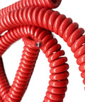 Straight Up Heavy Duty Stretch Coiled Extension Cord With Hella Tough Polyurethane Jacket and Flexible Spring Design That Kills Tangles And Delivers Clean Power Indoors Or Outdoors For Fifteen Meters, coiled red cord visible.
