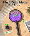 Electric Fly Swatter Bug Zapper Racket 4000V with LED Screen dual modes displayed on a table with charging base.