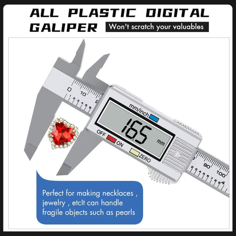 Go-To Digital Caliper With LCD Display 0 To 6 Inch Range measuring jewelry with red heart gem, inch to millimeter conversion visible