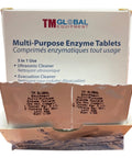 Open box of TM Global Multi-Purpose Enzyme Tablets with bilingual labeling for ultrasonic and evacuation cleaner use.