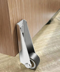 Close-up of Heavy Duty Vertical Track Roller Wheel For Smoothly Gliding Doors, mounted on wooden surface.