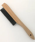 Wire brush with wooden handle, part of Heavy Duty Welding Chipping Hammer With Coil Spring Handle For Shock Absorption set.