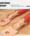 Close-up of copper lugs with red cables from Pro Grade Heavy Duty Battery Cable Crimping Tool Kit With Ratchet Hex Extended Handle