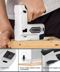 2 In 1 Cordless Electric Staple Gun And Brad Nailer Kit being used for woodworking with close-up on safety features, 4V Lithium Ion Battery