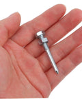 Close-up of a hand holding a metal spike from 20 Piece Lawn Aerator Shoes Spikes Kit Durable Metal Aeration Tool For Garden Loosens Compacted Soil