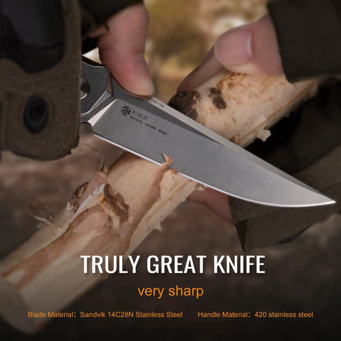 Close-up of the Hard Hitting Tactical Folding Pocket Knife For Men With 14C28N Stainless Steel Blade carving wood.
