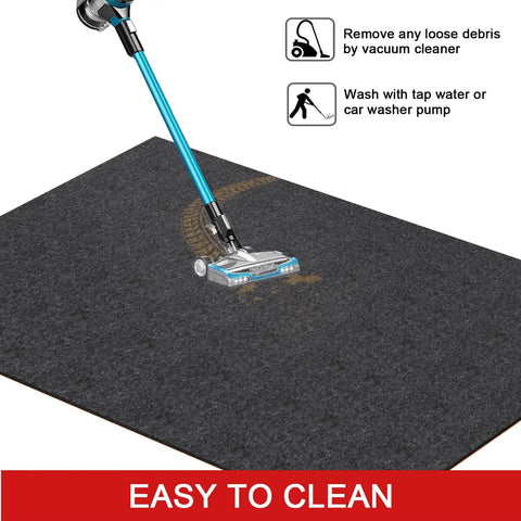 Close-up of Oil Spill Mat For Garage Floor 64x32 Inches Under Car Absorbent And Waterproof Shop Grade Floor Protector being vacuumed
