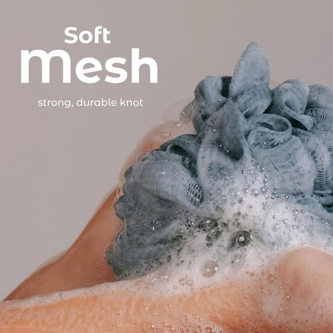 Set of 3 Soft Mesh Bath Shower Loofah Sponges Pouf Body Scrubbers For Gentle Exfoliation And Deep Cleanse With Spa Quality Feel Airy Blossom Color Premium, shown in use.