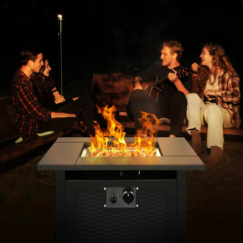 28 Inch Fire Pit Table With 50000 BTU Propane Patio Heater in use during backyard hangout with friends around it at night.