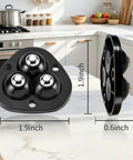 Zero Grunt Work Appliance Sliders With 8 Heavy Duty Self Adhesive Casters And 16 Extra Pads, 1.9 inch black sliders on marble countertop.