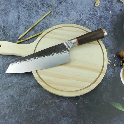 Beast Mode 7 Inch Meat Cleaver For Kitchen Prep, chef grade forged steel 5Cr15Mov blade with durable sheath on cutting board