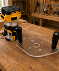 Clear Acrylic Router Base Plate With Reinforced Dual Handles For Compact Routers, 6x10 in. on a wooden table with router.