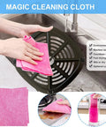 Magic cleaning cloth being used over a crisper tray in a sink, showcasing easy cleanup with pink non-abrasive fabric.