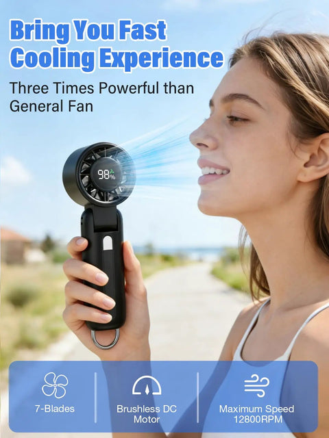 Person using Turbo Handheld Personal Fan With 12,800 RPM Power, 7-Blade High-Speed Portable Mini Fan outdoors