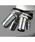 Close-up of objective lenses on a Digital Compound Binocular Microscope With 40X To 2000X Magnification, Brightfield Tungsten Illumination