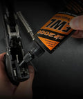 Extreme Weapons Lube CLP Gun Lube And Cleaner Synthetic Gun Lubricant With Anti Wear Additive For Duty And Hobby Firearms 1 Oz Squeeze Bottle Keeps Metal Surfaces Slick And Protected For Range Ready Performance, applying to handgun slide