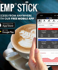 Person holding phone with Remote WiFi Temperature And Humidity Sensor With Data Logger app near coffee cup.