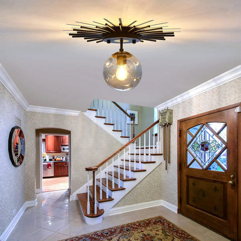 Sleek Black Flush Mount Ceiling Light With Glass Globe Sputnik Starburst 1 Light Close To Ceiling Fixture in a hallway.