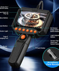 Dual Lens Endoscope Camera With Light Pro Grade HD 1920P Borescope For Pipes And Car Repairs, 4.3 Inch LCD, IP67 Waterproof, 16.4 Ft Semi-Rigid Cable, 8 LED Lights, 32GB Card Included. Handheld display with control buttons and cable port.