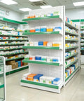 Heavy Duty Adjustable Gondola Shelving Unit Rock Solid Reinforced Steel Double Sided Retail Rack with pharmacy products on display.