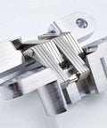 Built Tough Hidden Cabinet Hinges With Silky Smooth Glide Track For Folding Doors And Wood Boxes 180 Degree Swing Seamless Flush Install Satin Silver Finish Includes All Mounting Screws close-up view of hinge mechanism.
