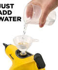Heavy Duty Handheld Steam Cleaner Badass Chemical Free Deep Powerhouse With 11 Slick Nozzles For Kickin Grime Off Floors Carpets And Kid Safe Home Sanitizing Tools filling water tank with a funnel.