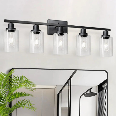 Dope Matte Black Five Light Wall Sconce With Clear Glass Shades, Modern Vanity Lighting, installed above mirror