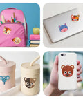 Easy Diamond Art Kit With Tools For Beginners stickers on backpack, laptop, mugs, and phone case; colorful animal designs.