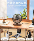 6.5 Inch USB Desk Fan with Quiet 3 Speed Settings on wooden desk, plugged into laptop, wood grain base visible