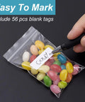 Hand writing on blank tag attached to Clear Zip Bags 4 By 6 Inch Pack Of 200 Reclosable Plastic Bags 2 Mil Thick Food Grade Safe Mini Baggies.