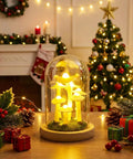 Mushroom Night Light In Glass Dome LED Decor With Wooden Base For Home Decor Gifts on holiday table with Christmas tree background.