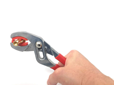 Soft Jaw Cannon Plug Pliers For Aircraft Electrical Connectors with slip joint handles in use.