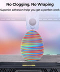 Rotated Tri Color Dope Coextruded PLA Filament 1.75mm 1kg 2.2lb Matte Finish Red Green Blue 3 In 1 Coextrusion For 3D Printing Color Shifts Every 50cm Premium Tolerance About 0.03mm showing smooth color transition on 3D printed egg.