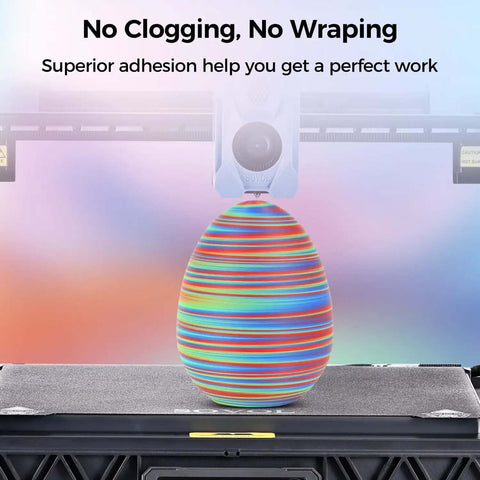Rotated Tri Color Dope Coextruded PLA Filament 1.75mm 1kg 2.2lb Matte Finish Red Green Blue 3 In 1 Coextrusion For 3D Printing Color Shifts Every 50cm Premium Tolerance About 0.03mm showing smooth color transition on 3D printed egg.