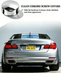 Hella Secure Stainless Steel License Plate Mounting Kit With One Quarter Inch By Three Quarter Inch Bolts Chrome Caps on luxury car rear.