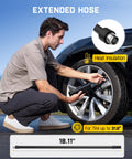 Man using X8 APEX EV Tire Inflator Portable Air Pump with extended hose on electric car tire. Heat insulation shown.