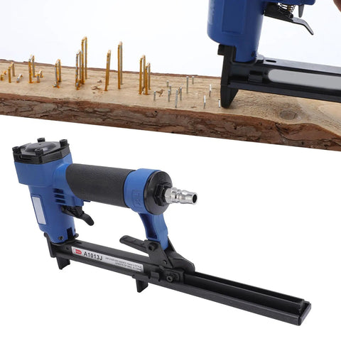 Pro Grade 20 Gauge Pneumatic Brad Nailer featuring Zero Jam Nozzle angled view on wooden surface with brads.