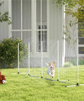 Dog running through Pet Agility Training 2-Piece Set With Weave Pole, 32.8-Foot Water Spray Hose, Training Stand in a backyard.