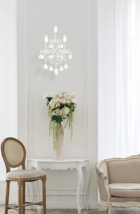 Royal Cut Clear Maria Theresa 3 Light Crystal Wall Sconce in Chrome Finish on elegant white wall, modern glam lighting for living rooms