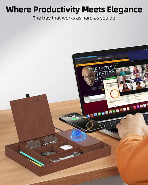 Leather Wireless Charging Valet Tray for Men, EDC Nightstand Organizer with phone, glasses, watch, and laptop on a wooden desk