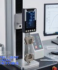 Six Way Testing Kit Digital 1000N Force Gauge With USB C Data Output N Kg Lb Units Push Pull Gauge For Tension And Compression Testing Battery Powered Includes Four Compression Platters Tension Hook And Extension Shaft, mounted on test rig